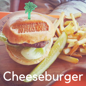 A cheeseburger platter with a stamp burned into it