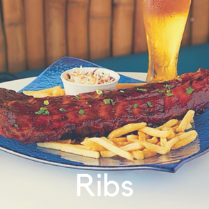 A rack of ribs with fries
