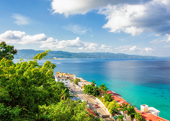 A view of Montego Bay's Hip Strip, a perfect spot for family friendly Jamaican restaurants, shops and more